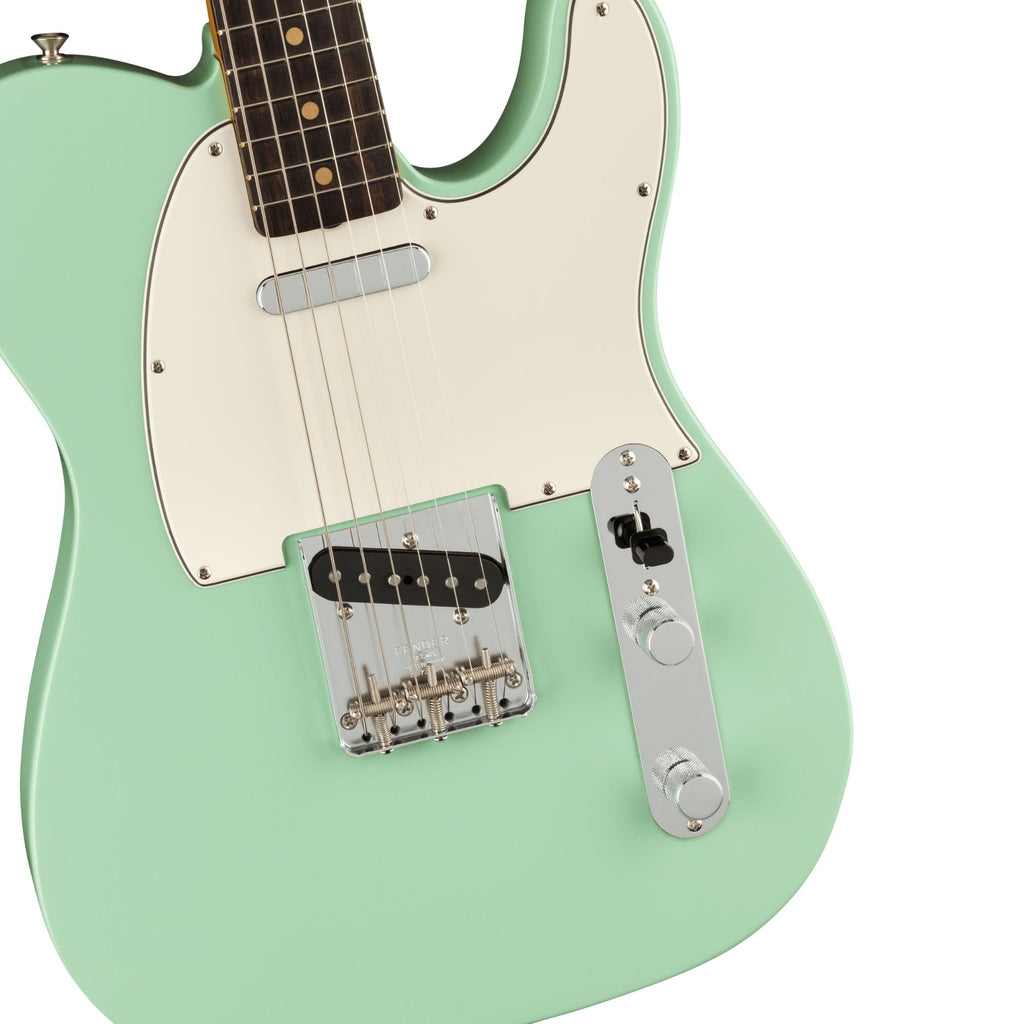 Fender American Vintage II 1963 Telecaster electric guitar with rosewood fingerboard in surf green color, showcasing its classic design.