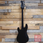 Fender Duff McKagan Deluxe P Bass in black with a rosewood fretboard, showcasing its sleek design and craftsmanship.