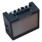 Black Fender MD20 Mini Deluxe Guitar Amplifier showing control knobs and compact design for portable practice.