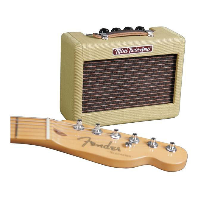 Fender Mini 57 Twin Amp guitar amplifier in classic tweed finish, compact size, and vintage-inspired design.