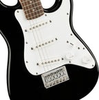 Fender Squier Mini Stratocaster electric guitar with black body and laurel fretboard, close-up view of the guitar's neck and fretboard.