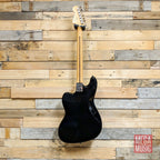 Squier Classic Vibe Bass VI with black finish and laurel fretboard, electric bass guitar with six strings and vintage-style hardware.