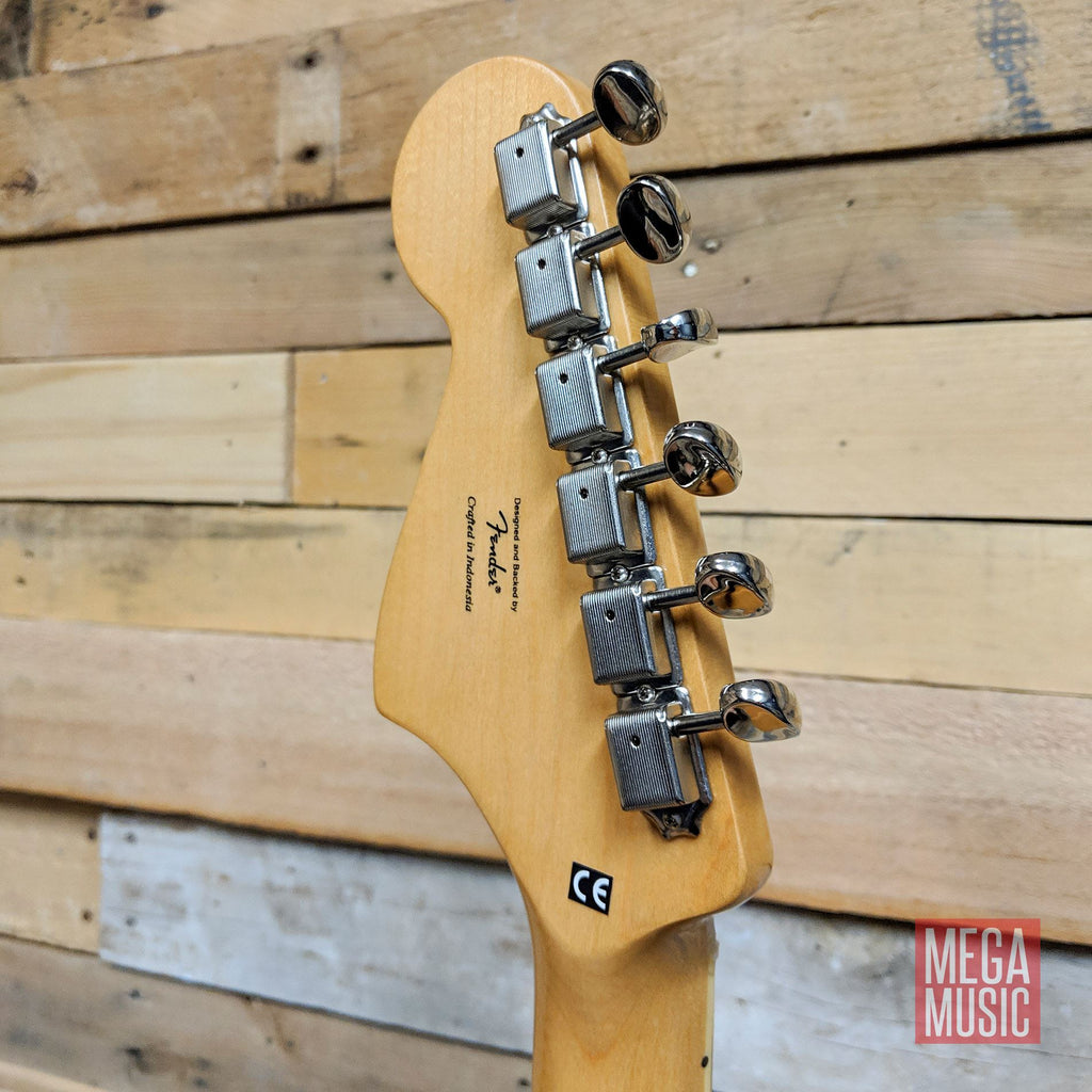Squier Classic Vibe Bass VI guitar with black body and laurel fretboard, showcasing its six-string design and vintage-style hardware.