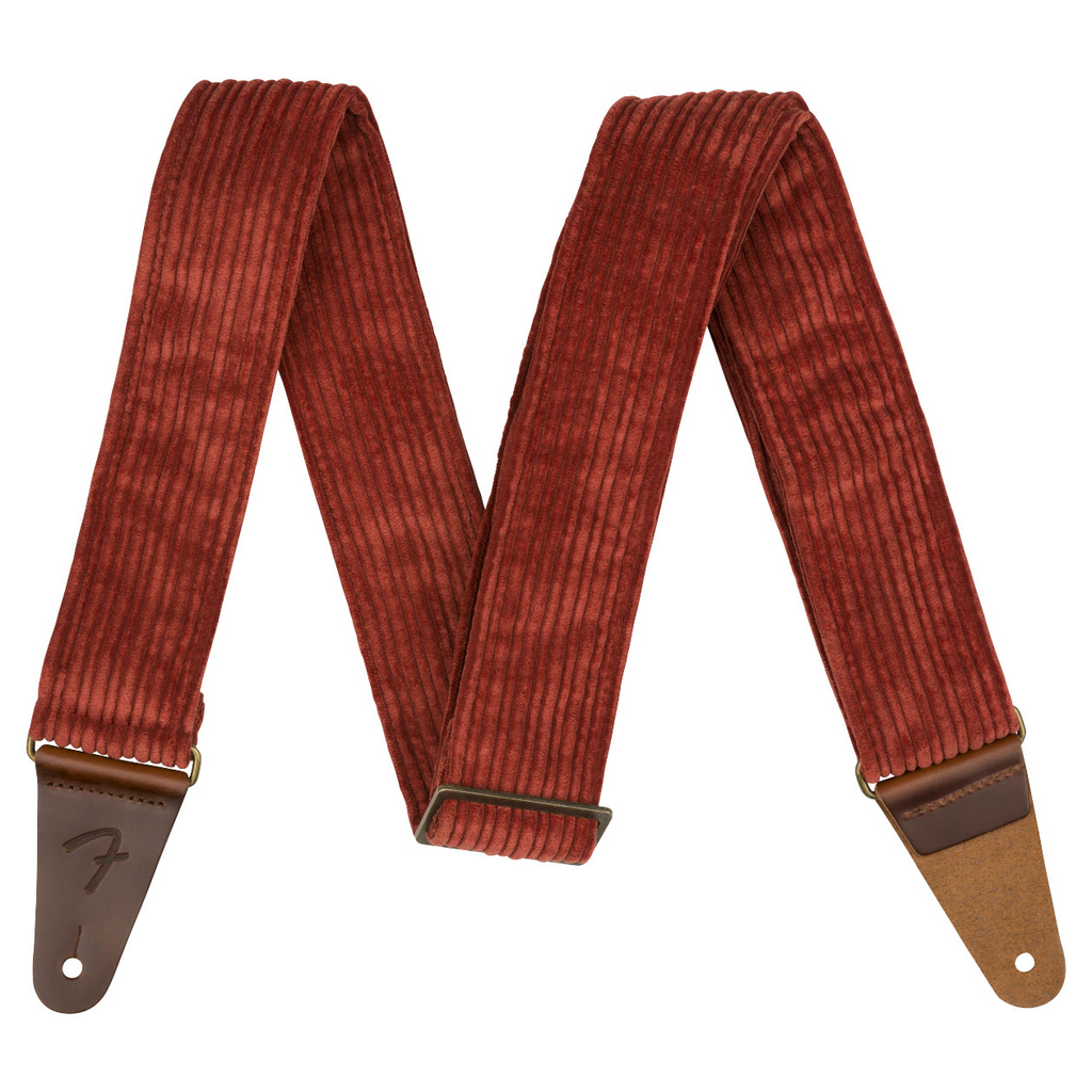 Fender corduroy guitar strap in antique cherry color with adjustable length and padded comfort for acoustic or electric guitars.
