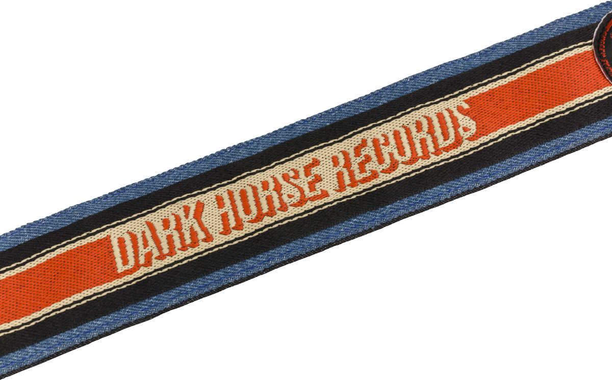 Fender George Harrison Dark Horse Records 2-inch logo guitar strap with dark strap and prominent logo design.