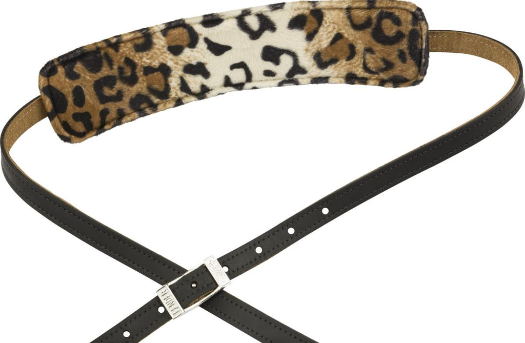 Fender Joe Strummer vintage saddle guitar strap with leather ends and woven fabric design for electric guitar playing.