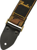 Fender Legacy Vintage Monogram guitar strap with leather ends and vintage design, adjustable for comfortable playing.
