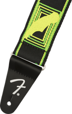 Fender Neon Monogrammed 2-inch guitar strap in vibrant green and yellow with branded logo and neon accents.