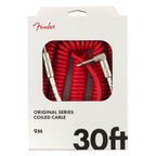 Fender Original Series 30ft straight-angle guitar cable in Fiesta Red, showing the flexible coil and durable connectors.