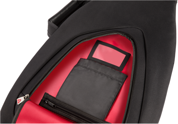 Black Fender fretboard electric bass gig bag with padded interior and sturdy zipper for safe transport of guitar accessories.