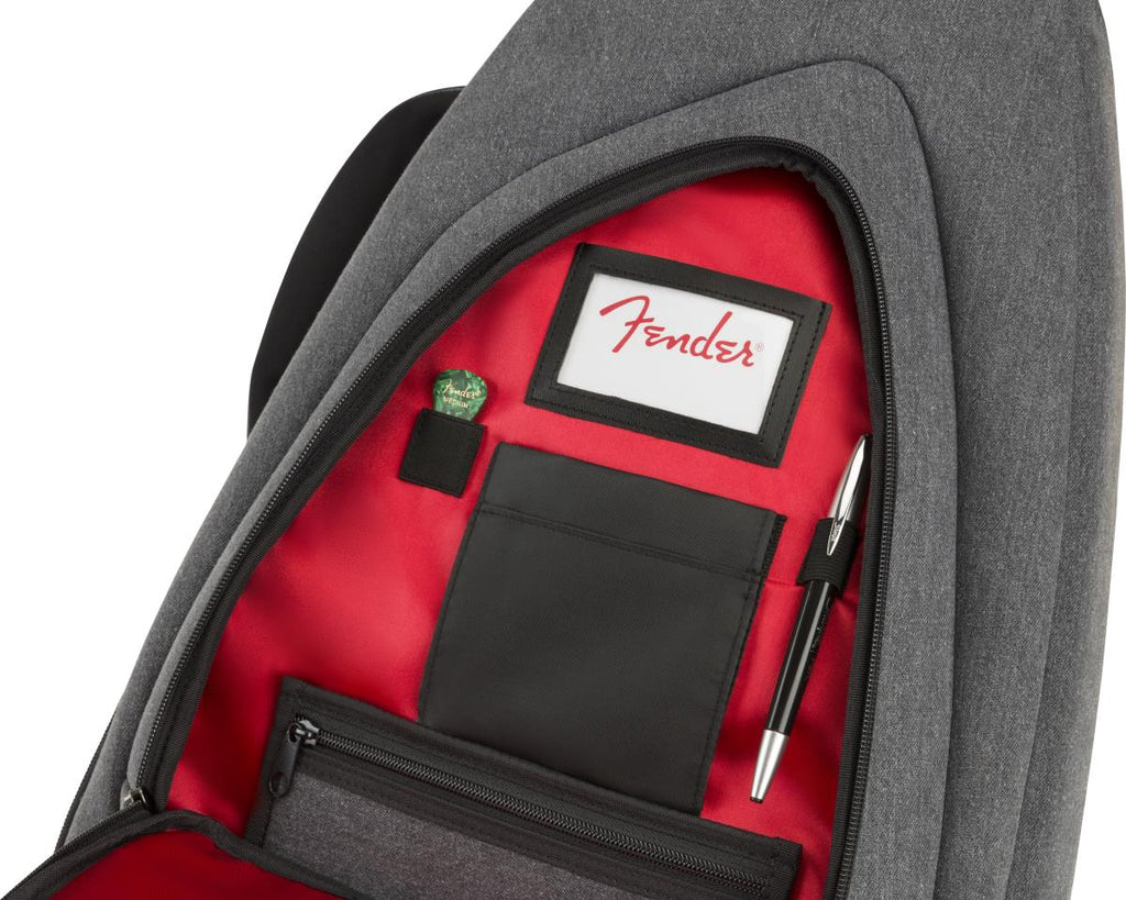 Fender FE920 electric guitar gig bag in gray denim with padded shoulder straps and carrying handle for easy transport.