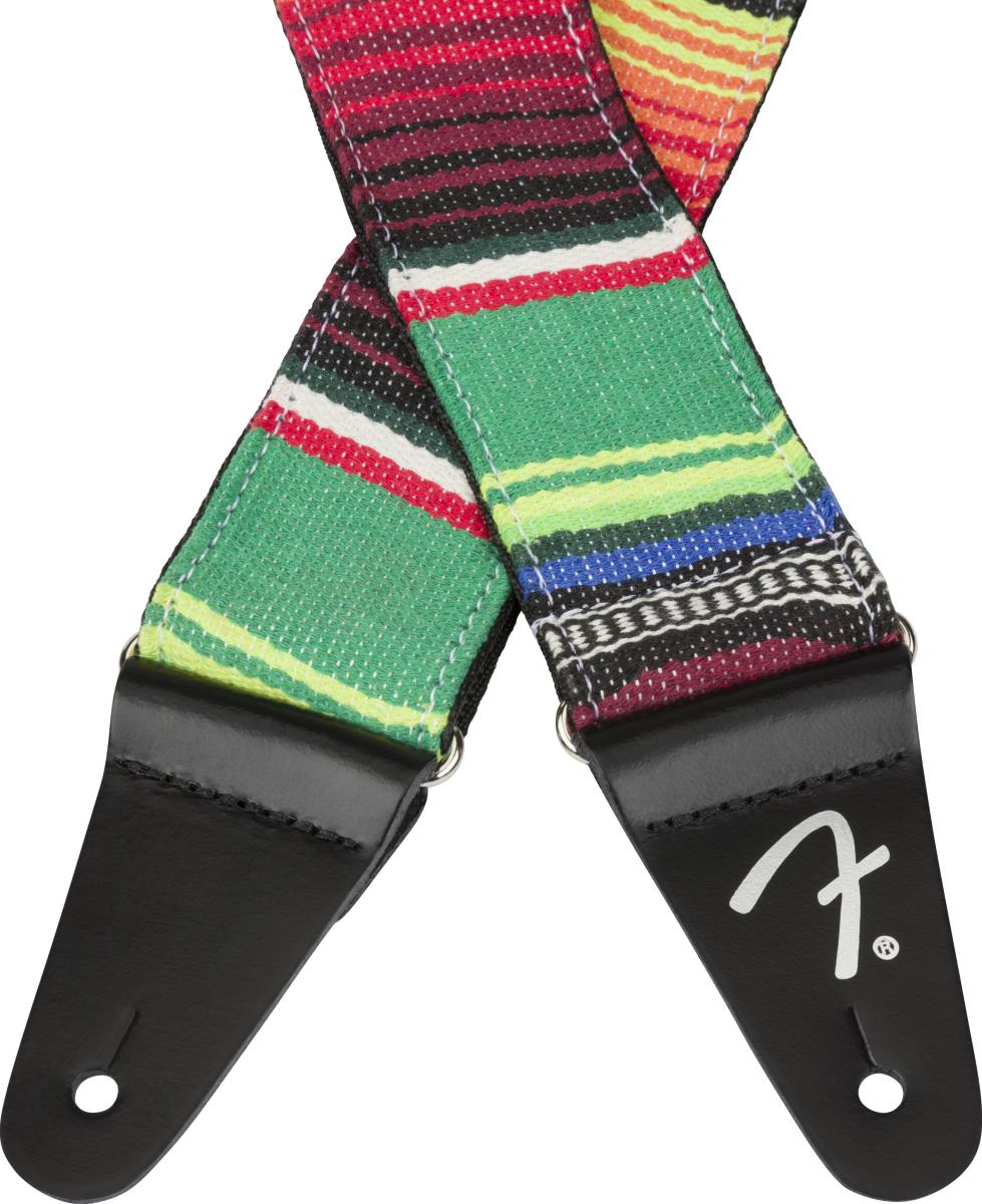 Fender Serape 2-inch guitar strap in vibrant green multi-color woven fabric with leather ends for secure attachment.