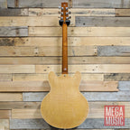 Heritage Standard H-530 semi-hollow electric guitar in antique natural finish with f-hole design and maple neck.