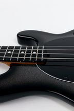 Ernie Ball Music Man Stingray Special 4H bass guitar with smoked chrome finish and black hardware, shown from front angle.