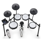 Alesis Nitro Max 8-piece electronic drum kit with mesh heads and Bluetooth connectivity, displayed with drum pads and cymbals.