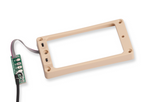 Seymour Duncan TS-2B Triple Shot LP Bridge pickups in cream color, shown installed on a guitar neck.