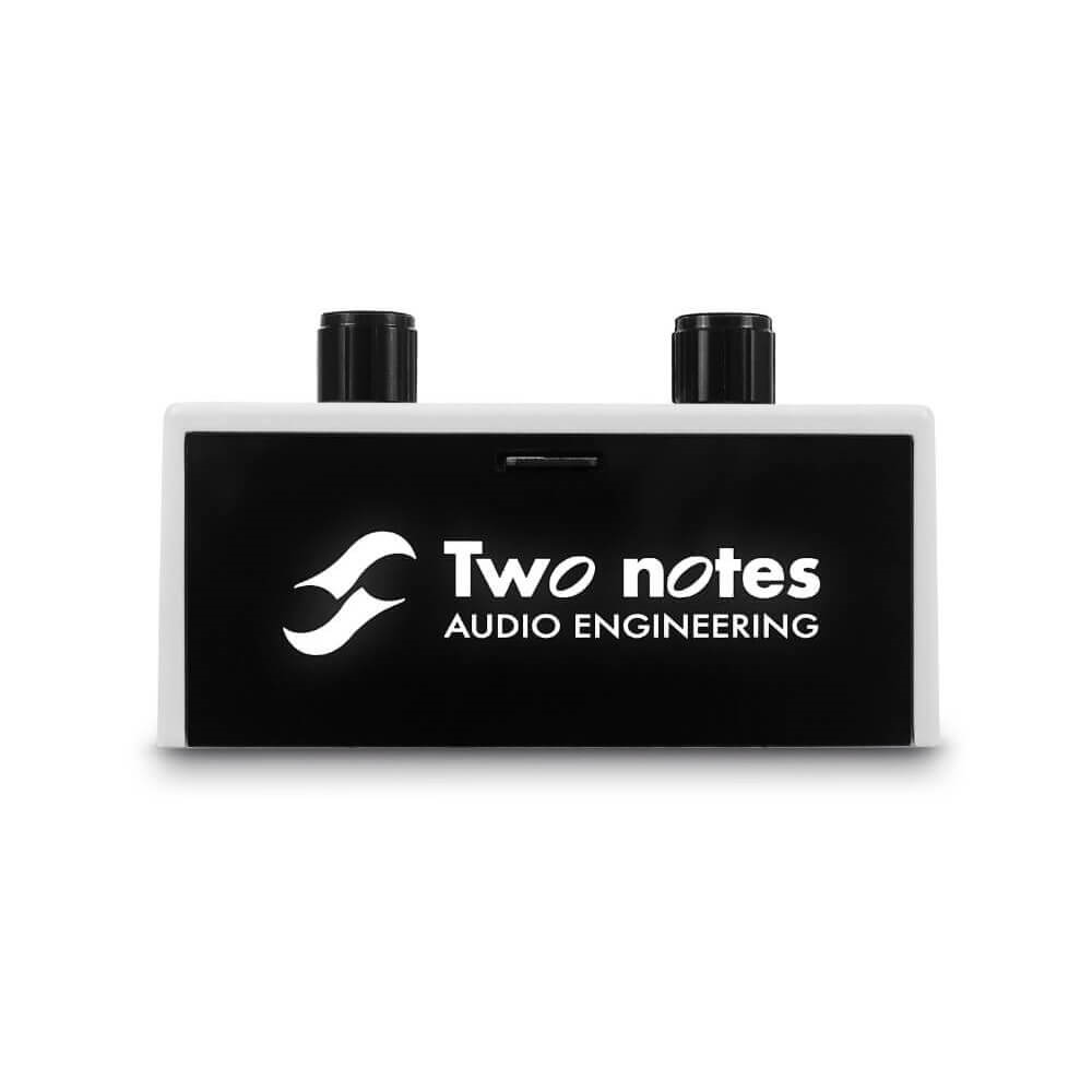 Two Notes Torpedo C.A.B. M+ cabinet simulator guitar effects pedal with control knobs and input/output jacks, black finish.