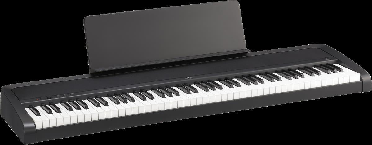Korg B2 88-key weighted hammer action digital piano in black, showing the keyboard and control panel.