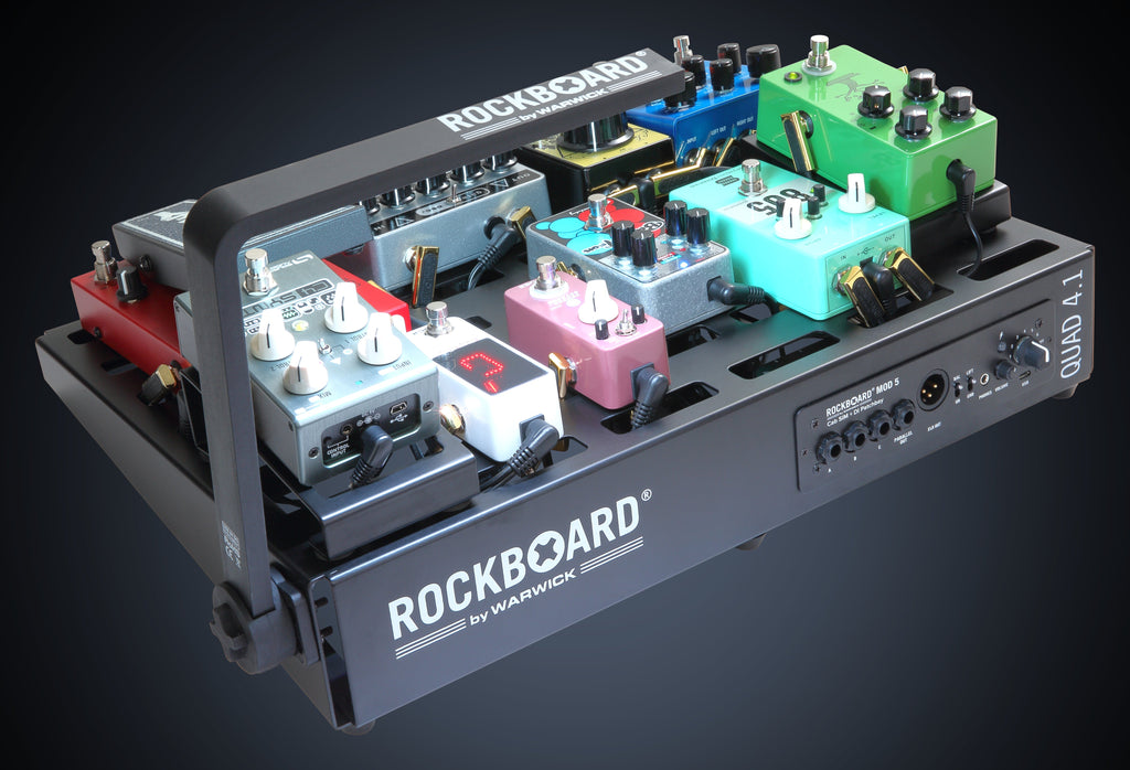 RockBoard Pedalboard LED Light v2 illuminating a pedalboard, showcasing its sleek design and adjustable brightness features.