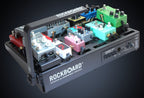RockBoard Pedalboard LED Light v2 illuminating a pedalboard, showcasing its sleek design and adjustable brightness features.