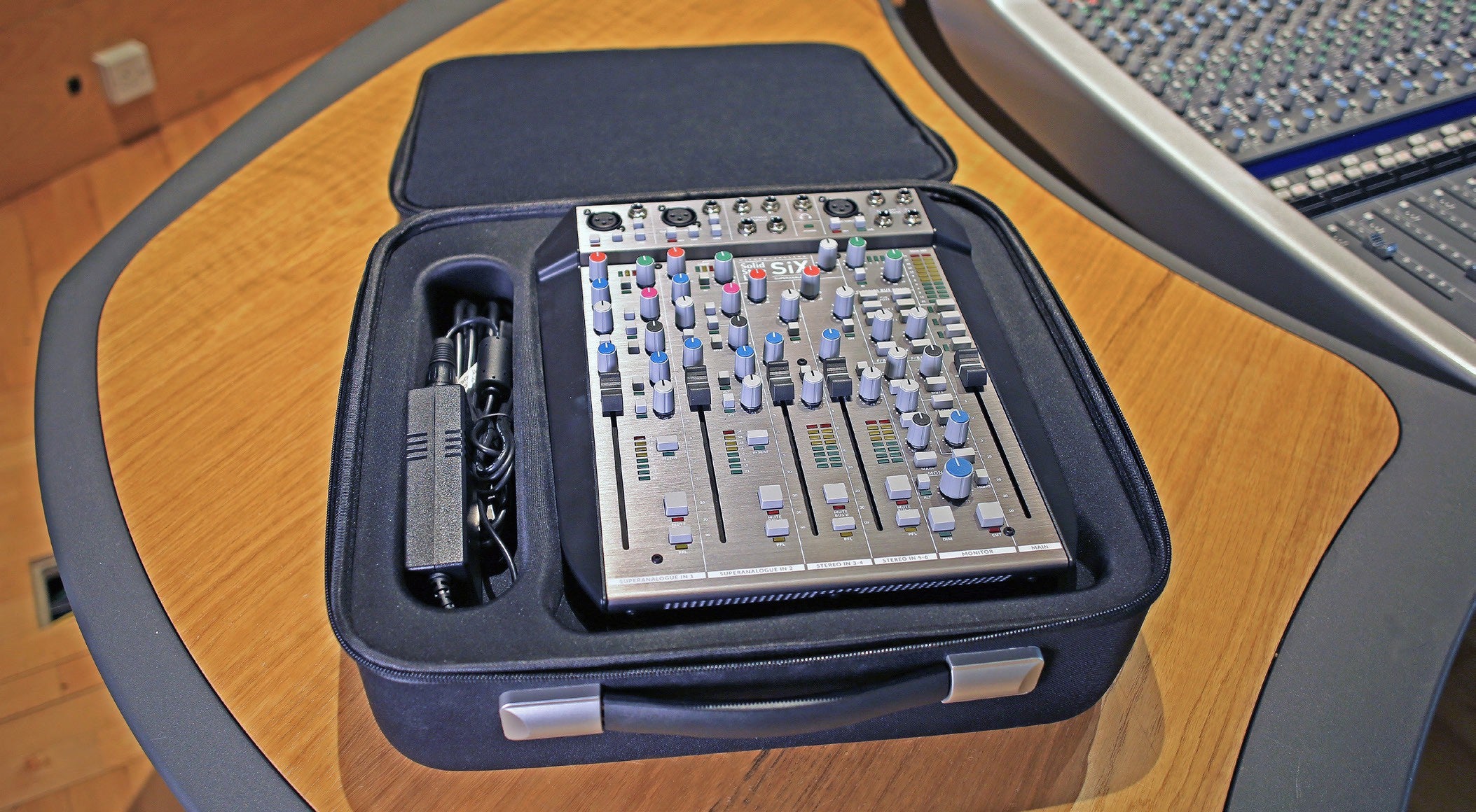 Solid State Logic Six Carry Case for rack gear, featuring durable material and a sleek design for protection and transport.
