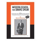 Modern School for Snare Drum book by Morris Goldenberg, a comprehensive drum music instructional book with sheet music pages.