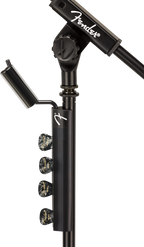 Fender telescoping boom microphone stand with adjustable arm and sturdy tripod base, suitable for live performances and studio use.