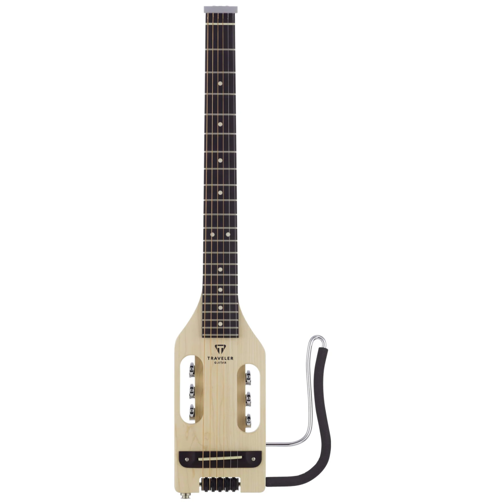 Traveler Guitar Ultra-Light acoustic-electric guitar in maple, showing the body, fretboard, and headstock in a natural setting.
