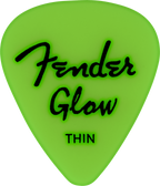 Set of 12 Fender glow-in-the-dark guitar picks, featuring translucent design and durable plastic for easy playing.
