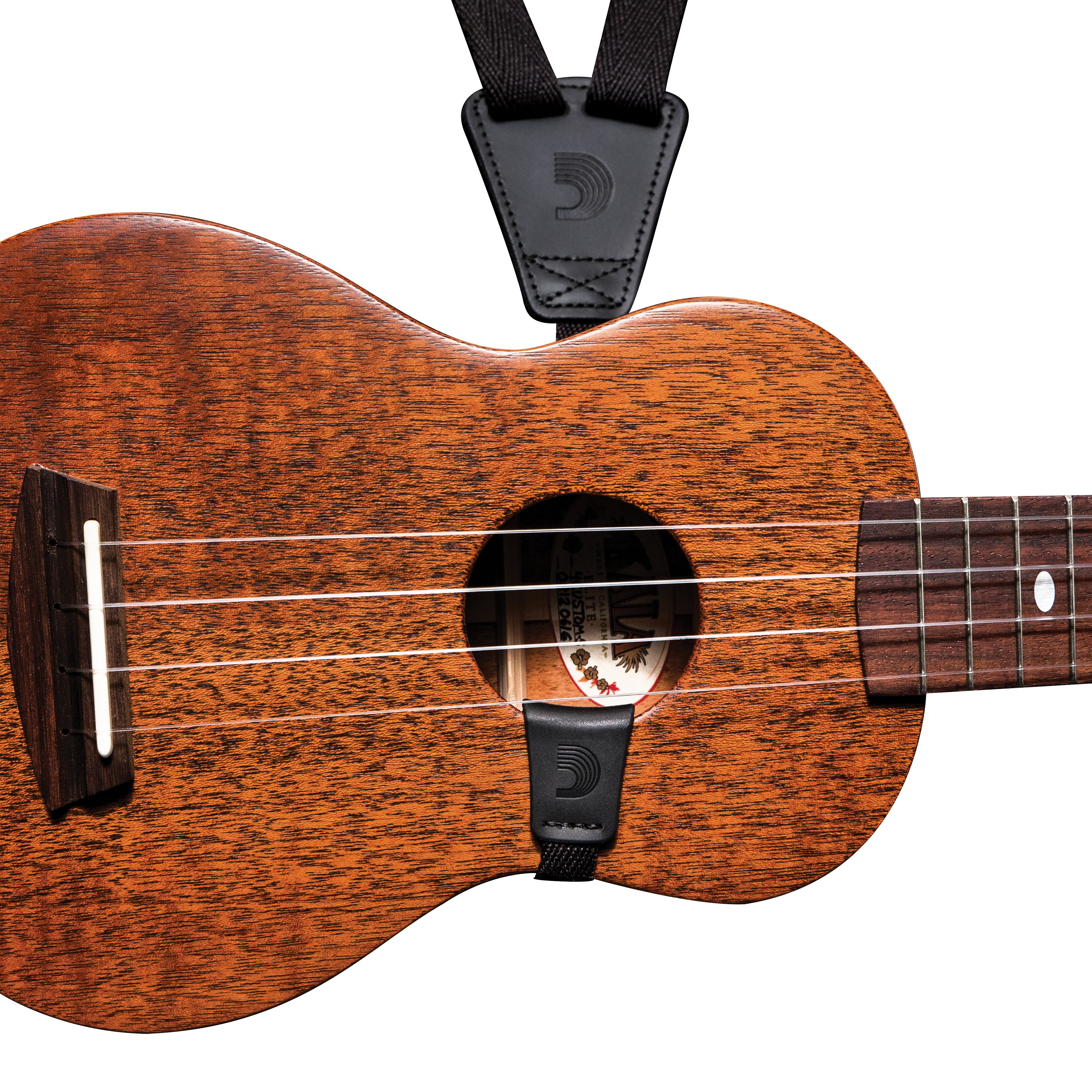 Black 19mm D'Addario ukulele strap with adjustable length, designed for comfortable support during playing.