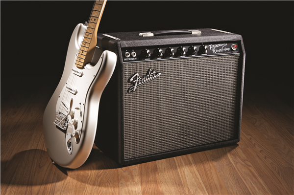 Fender '65 Princeton Reverb 12W 1x10" tube guitar combo amplifier with control knobs and vintage design.