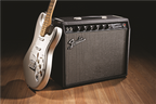 Fender '65 Princeton Reverb 12W 1x10" tube guitar combo amplifier with control knobs and vintage design.