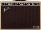 Fender Tone Master Deluxe Reverb guitar amplifier in blonde finish, with control knobs and vintage-style design.