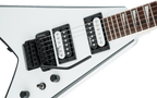 Jackson JS Series King V JS32 electric guitar with amaranth fingerboard in white with black bevels, showcasing its sleek body and hardware.
