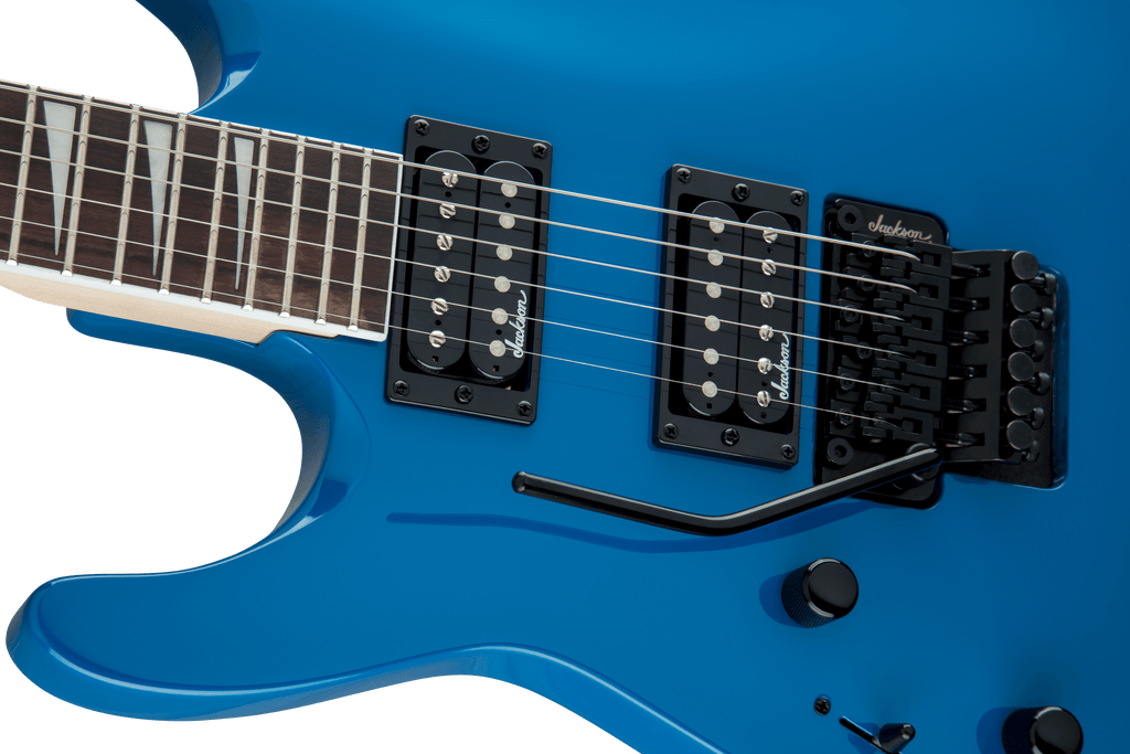 Jackson JS Series Dinky JS32 DKA LH electric guitar with bright blue finish and amaranth fingerboard, featuring an arch top design.