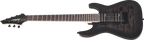 Jackson JS22-7 Dinky arch top 7-string electric guitar in transparent black burst finish, showcasing its sleek body and headstock.