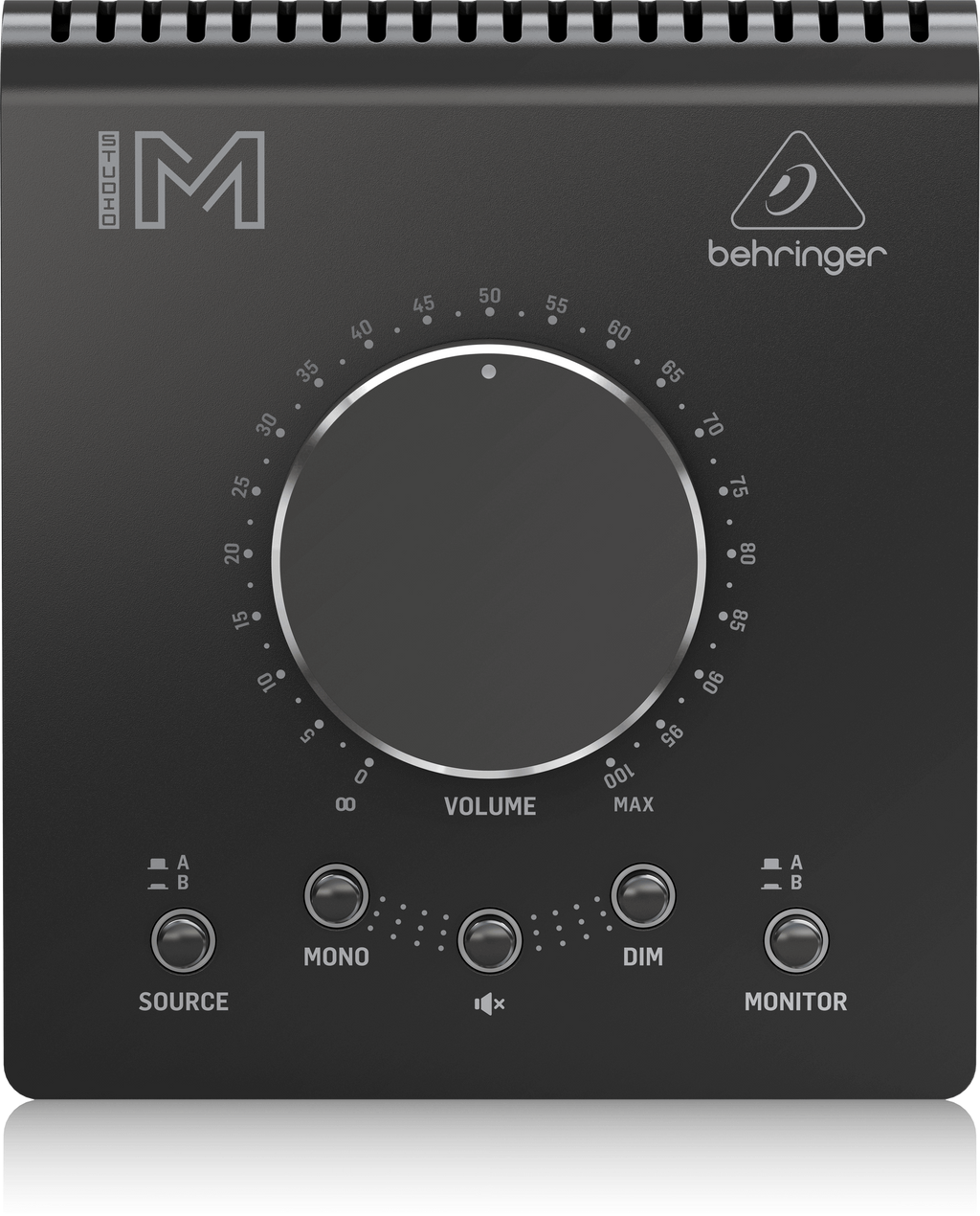 Behringer Studio M studio monitor controller with multiple input and output options for professional audio setup.