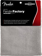 Gray Fender factory microfiber cloth for guitar maintenance, designed for cleaning and polishing guitar surfaces.