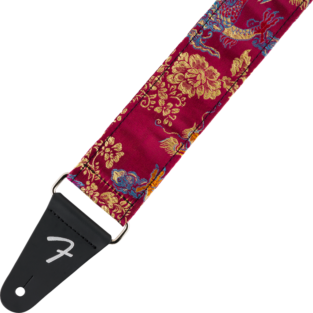 Fender Satin Dragon guitar strap in wine color featuring a detailed dragon design, adjustable strap for electric or acoustic guitars.