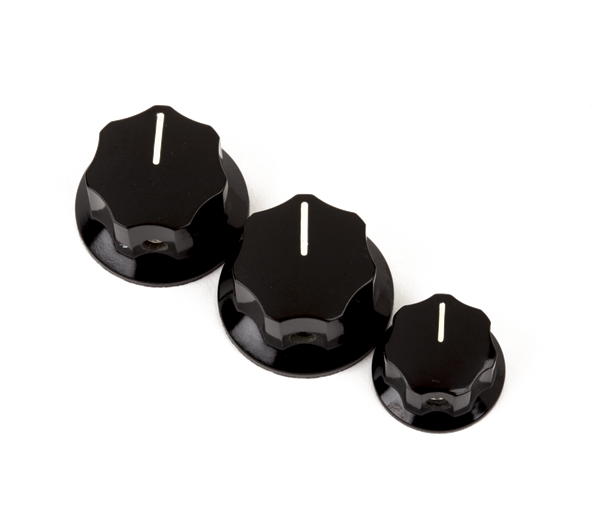 Fender Jazz Bass knobs set with two large and one small black control knobs for guitar volume and tone adjustment.