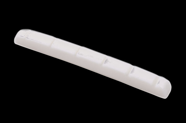 NUT - GUITAR, MELAMINE, SLOTTED