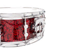 SONOR Momentum Birch 14x5.75-inch red pearl snare drum with polished metal hardware and textured finish.