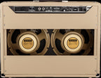 Fender Tone Master Twin Reverb Blonde guitar amplifier with control knobs and speaker grille, showcasing a sleek vintage design