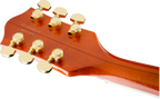 Gretsch G6120T Players Edition Nashville electric guitar in orange stain with chrome hardware and vintage-style pickups.