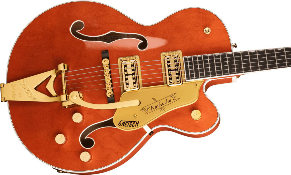 Gretsch G6120TG Players Edition Nashville hollow body electric guitar with Bigsby, gold hardware, and orange stain finish.