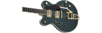 Gretsch G6609TG Players Edition Broadkaster Centre Block electric guitar in Cadillac Green with double-cut body and chrome hardware.