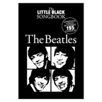 Open guitar songbook featuring The Beatles' classic songs from The Little Black Songbook of The Beatles Songs, with sheet music and chords.