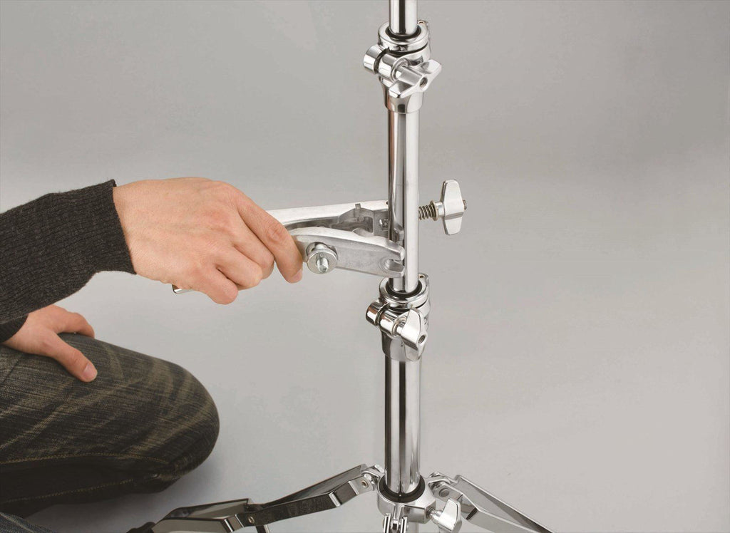Tama MCA63EN cymbal attachment for drum hardware, showing a metal clamp with mounting hardware for securing cymbals.