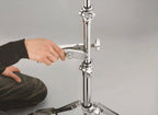 Tama MCA63EN cymbal attachment for drum hardware, showing a metal clamp with mounting hardware for securing cymbals.