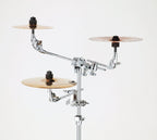 Tama MC7 Multi Clamp for drum hardware, showing adjustable metal clamp with tightening knob, used to secure drum accessories.